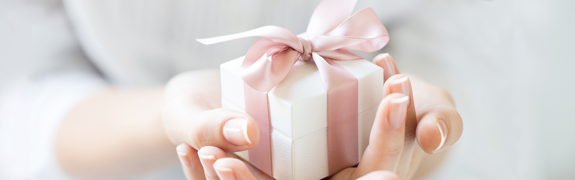 Gift box with pink ribbon